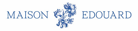 Signature Maison Edouard avec motif floral bleu inspiré du patrimoine textile et du savoir-faire artisanal